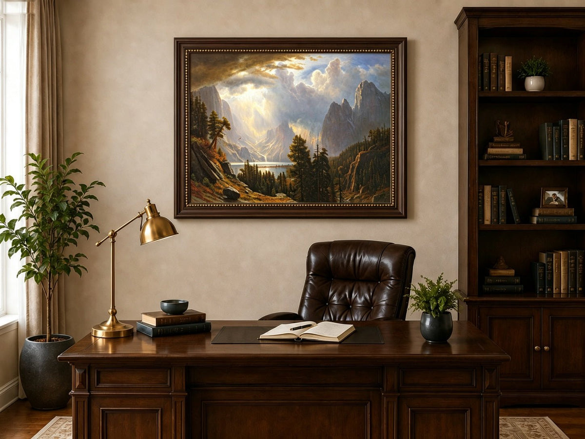 Framed hand-painted Yosemite Valley oil painting with storm clouds and dramatic sunbeams displayed above a traditional home office desk.