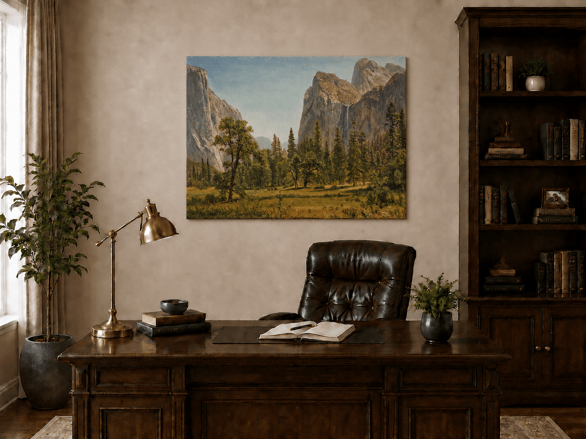 Unframed hand-painted Yosemite Valley oil painting with a waterfall and towering granite cliffs displayed above a traditional home office desk.