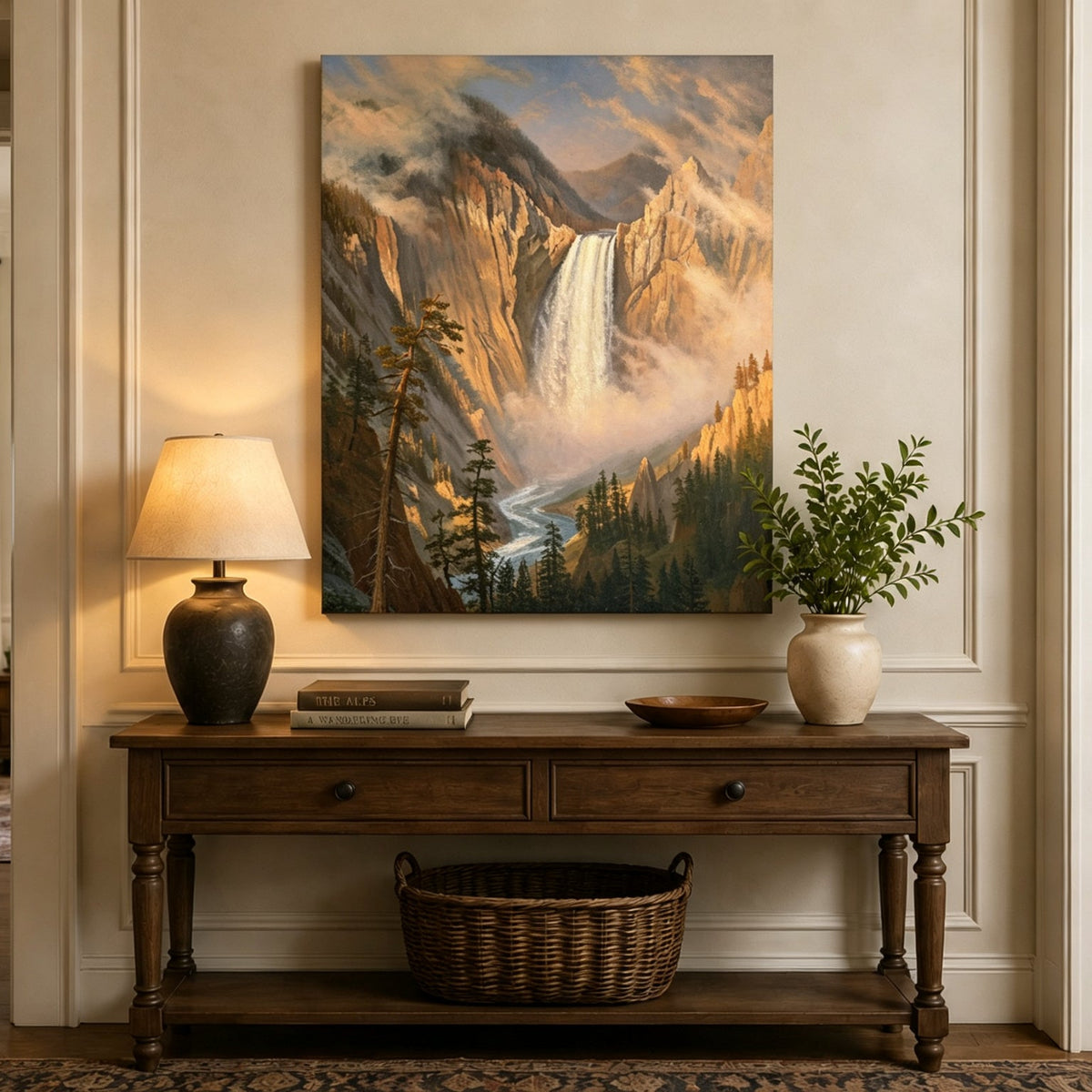 Unframed hand-painted Yosemite waterfall oil painting with sunlit mist and granite cliffs displayed above an entryway console table.